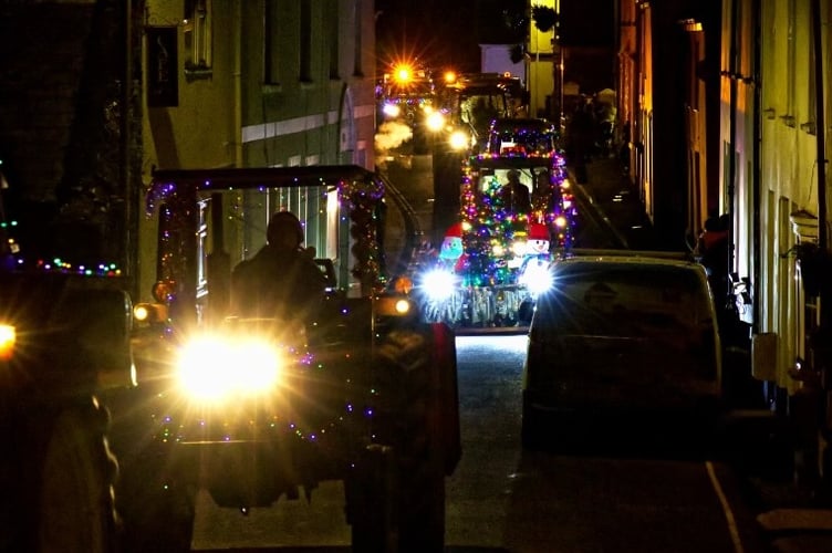 A noisy rally of colourfully lit tractors drew the crowds in Bere Alston and Bere Ferrers for the annual Christmas tractor run to raise funds for small local causes. Pictures by Mike Wright.