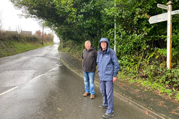 Residents on Violet Lane, Tavistock, are opposing a housing plan they say will be a blight on the countryside. Steve Hart and Bob Chapman looking towards Green Hill, of which an access to the proposed new estate could be built.