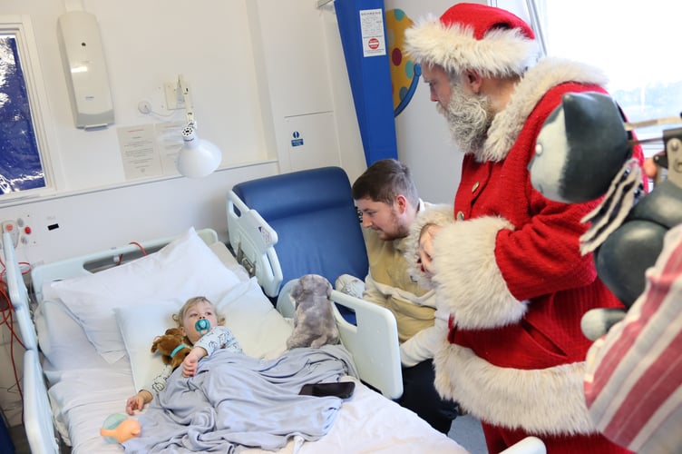 Derriford Hospital young patients have an uplifting visit from Santa.