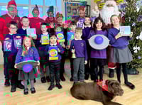 Santa brings joy and gifts to schools