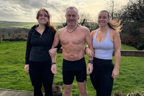 Charity swimmer Will Crosby and his daughters. Picture by Will Crosby.