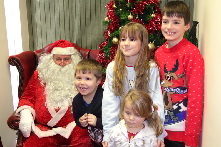 Tavistock Lions Father Christmas Grotto with Toby, Molly, Trudi and Travis in the Bedford Hotel.