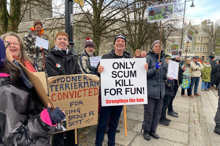Anti-hunt protesters make their voices and views heard and seen at the Boxing Day meet of Spooners & West Dartmoor Hunt in Tavistock's Bedford Square today.