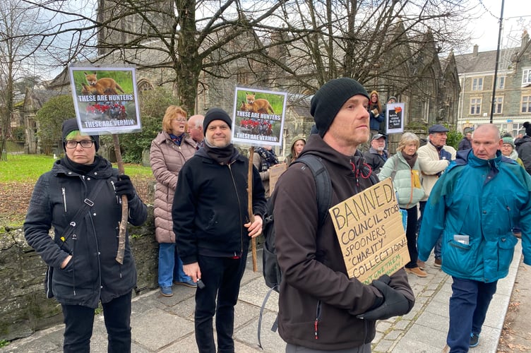 Anti-hunt protesters make their voices and views heard and seen at the Boxing Day meet of Spooners & West Dartmoor Hunt in Tavistock's Bedford Square today.
