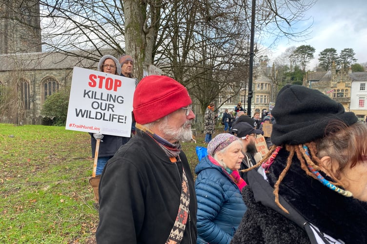 Anti-hunt protesters make their voices and views heard and seen at the Boxing Day meet of Spooners & West Dartmoor Hunt in Tavistock's Bedford Square today.