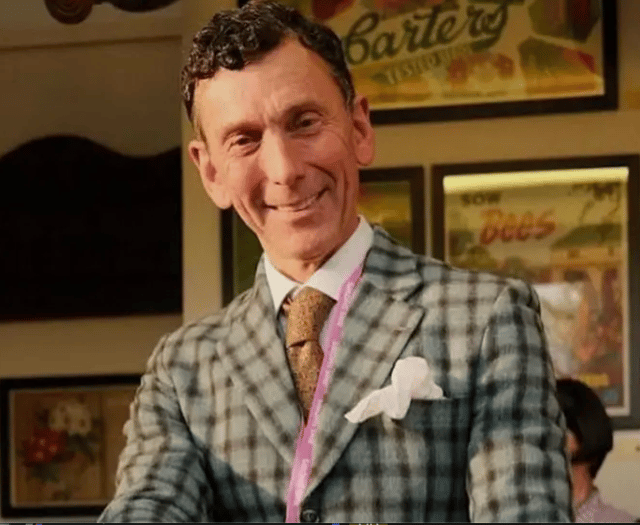 One of two men missing from a Christmas Day swim has been named