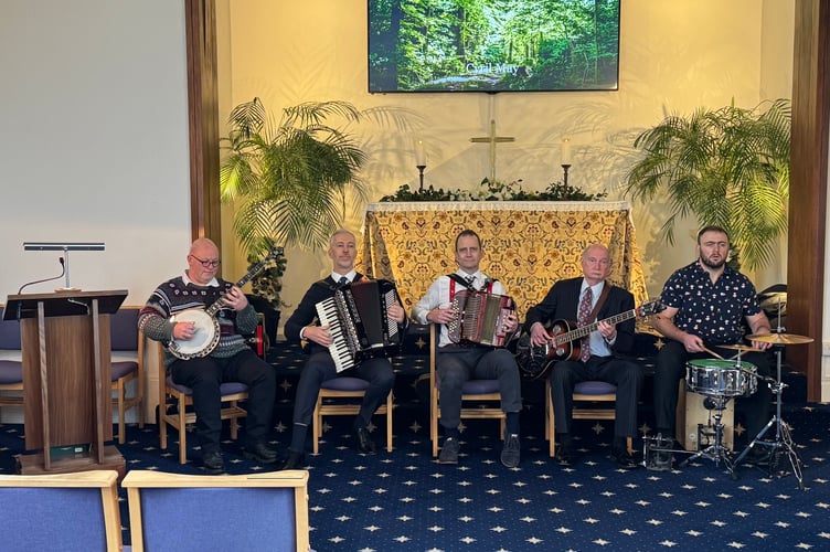 Dartmoor Pixie Band members playing at the funeral of Cyril May at Exeter and Devon Crematorium.  AQ 1130
