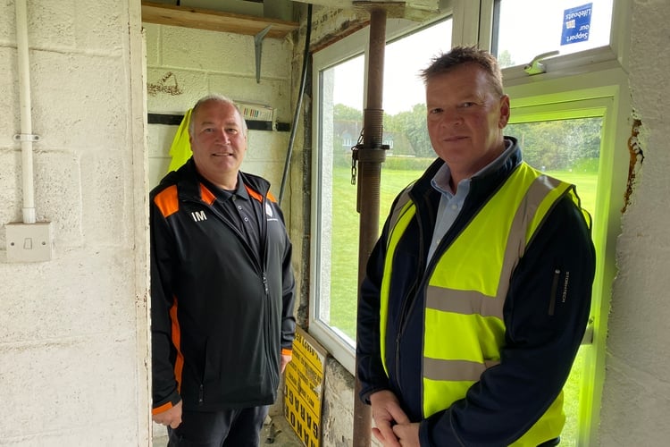 Horrabridge Rangers Sports Association secretary Ian Mulholland and contractorJonathan Case inside the old pavilion.