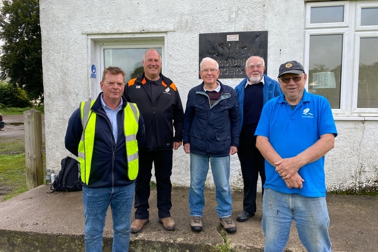 The team behind the newly-built Horrabridge community pavilion building outside the old one in Filace Park.