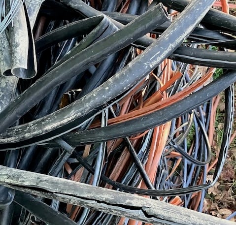 The cabling dumped on the nature reserve at Brentor.