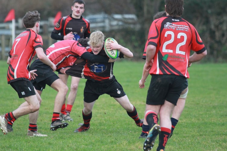 Under pressure in possession from Tavistock Rugby Club's Boxing Day game Locals v Legends. Picture Chris Hair.