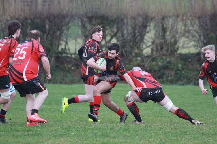 Evasive running from Tavistock Rugby Club's Boxing Day game Locals v Legends. Picture Chris Hair.