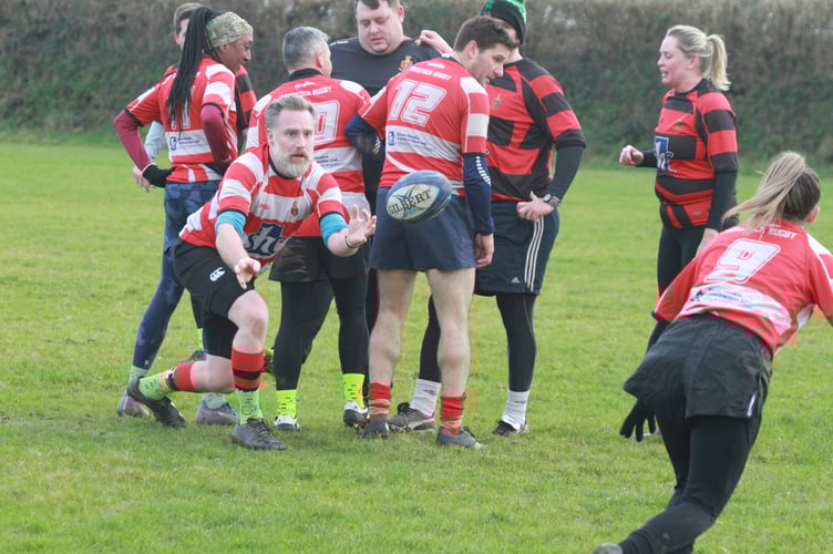 A quick getaway with the ball at the T1 Tavistock Rugby Club mixed gender non-contact Boxing Day clash. Picture by Chris Hair.