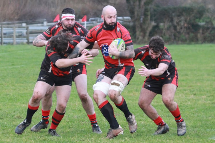 No way out with the ball from Tavistock Rugby Club's Boxing Day game Locals v Legends. Picture Chris Hair.