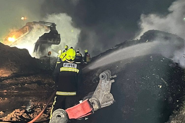 Firefighters at the scene of the compost blaze
