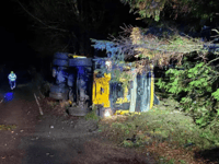 Gritter lorry overturns on ice