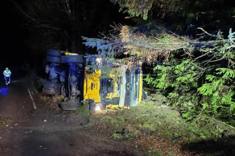 Road gritting lorry overturned on ice in Dousland. Picture by Princetown Fire Station.