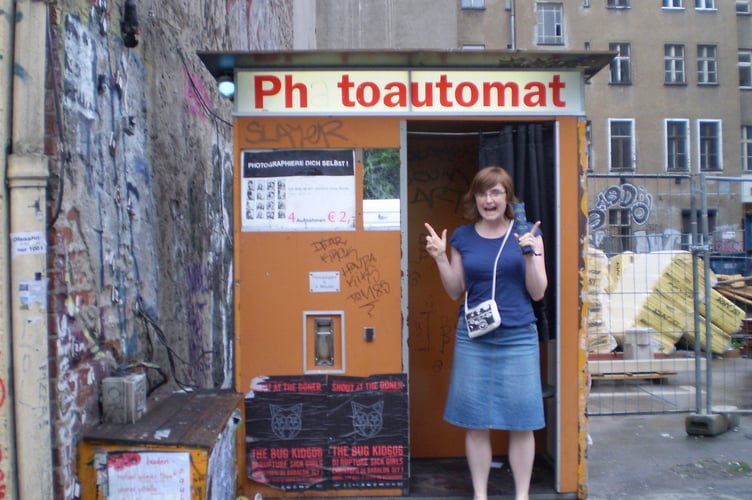 **CONTRIBUTOR REQUEST NO USAGE BY THE SUN, DAILY MAIL AND MAIL ONLINE**
// A woman who is obsessed with photobooths has had her picture taken in them hundreds of times - since she was 14. Artist Kate Tyler, 49, has been collecting memories in analog photobooths for over 30 years. She has dedicated her life to using these machines, both creatively and as a way of documenting her self and her family - collecting thousands of strips. Her passion for photobooths started with the passport photo machine that was built in to the wall of Lincoln railway station.