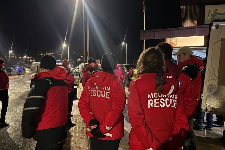 Tavistock Dartmoor Search & Rescue Team supported the WWII bomb emergency in Exmouth on Thursday. Here they are being briefed on evacuation procedures.