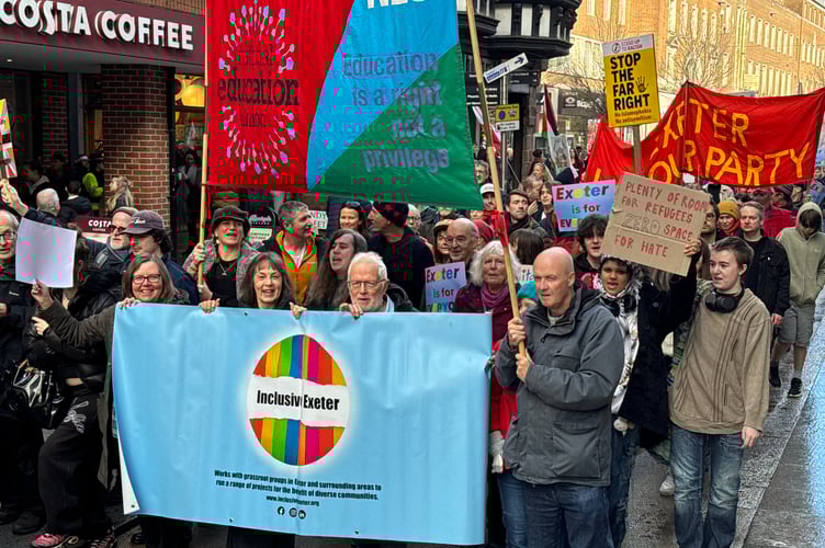 Inclusive Exeter and other groups in the Stand up to Racism march.  AQ 2650
