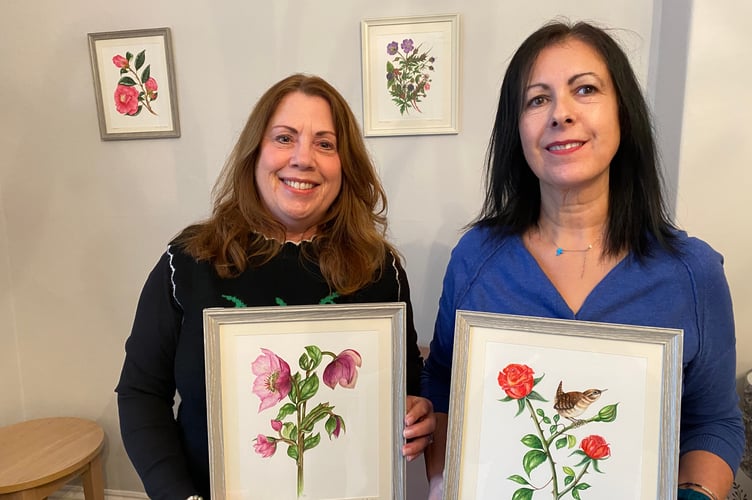 Artist Karen Austin, left, donating her water colours to Salema Dennis of Drake Lodge in Tavistock.