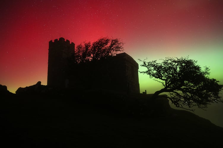 Aurora Borealis over Brentor Church, Dartmoor, by Colin Sargent.