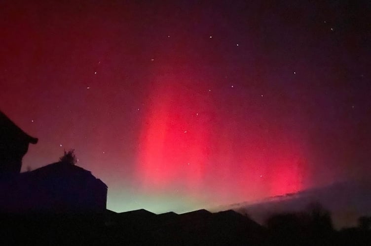 Nadine Lamb and her Northern Lights over Gulworthy.