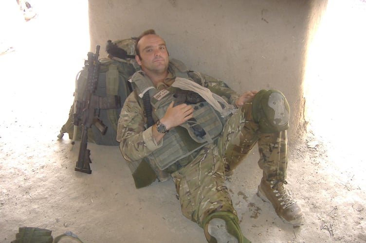 Royal Marine Lee Spencer, pictured on operations in Afghanistan, hits back at Trump 'insult'.