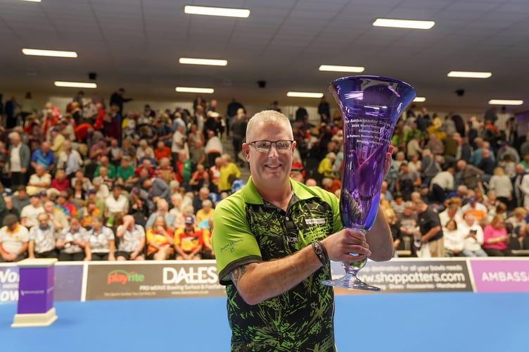 Ambassador Cruise Line 2026 World Indoor Bowls Championships open singles winner Robert Paxton with his trophy.