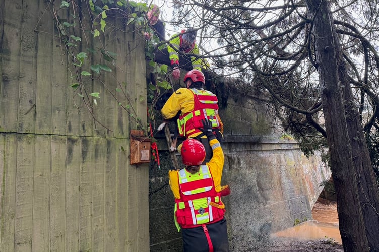The NDSART team helping to rescue people in East Devon.