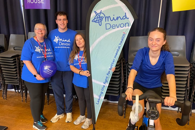 Super swimmer Barnaby Ryder is pictured with the Devon MIND charity members and a fellow Mount Kelly College pupils at his charity fixed cycle ride. 