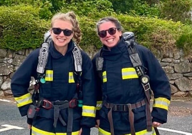 Two firefighters tough climb for colleagues