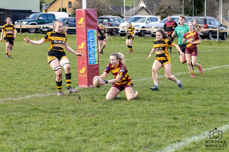 Okehampton cross for one of their 12 tries
