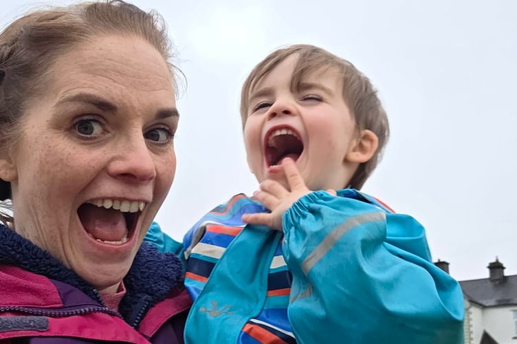 Stephie Harris and her son Noah at Princetown on one of their sponsored walks in aid of women in danger.