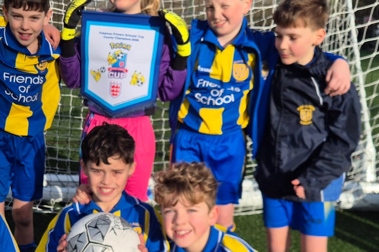 Bere Alston youngsters win Devon county small school football trophy.