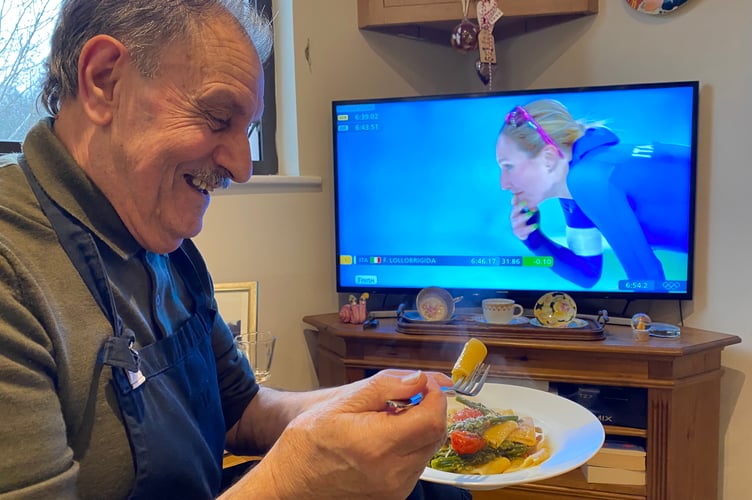 Giovanni Sponziello savours his patriotic tricolore pasta dish while watching compatriot Fran Lollobrigida at the Cortina Winter OIympics, Cortina.