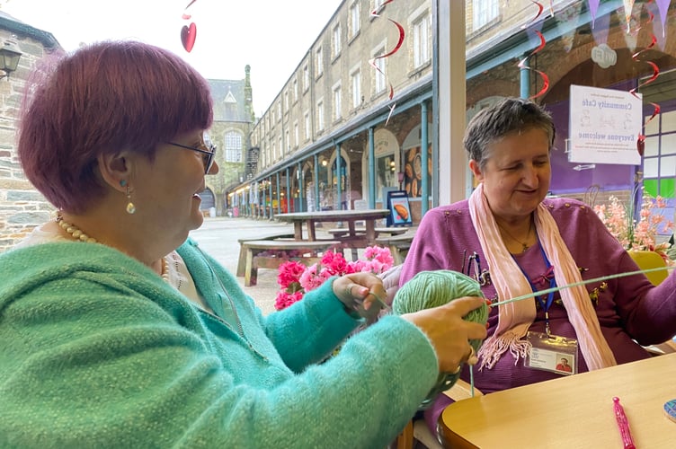 Nikki Parker is teaching beginners how to crochet at a knitting group for anyone wanting to create and chat at Tavistock Area Services (TASS) cafe.