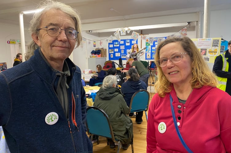 A community gathering by a new alliance to fight extremism attracted a crowd in Tavistock. Pictured at the event are West Devon Green Party members Lyn Howard and Andrew Prett.