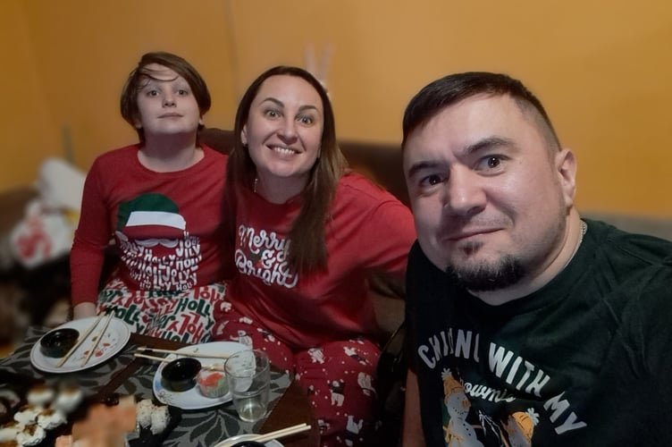 Ukrainian refugee Tania Mayorova, son Hordii, 12, and husband Alex in her beloved homeland.