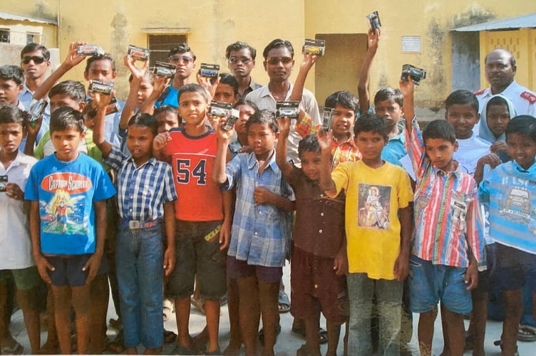 Salvation Army missionary Joan Williams, of Tavistock meets orphans on her final visit to India.