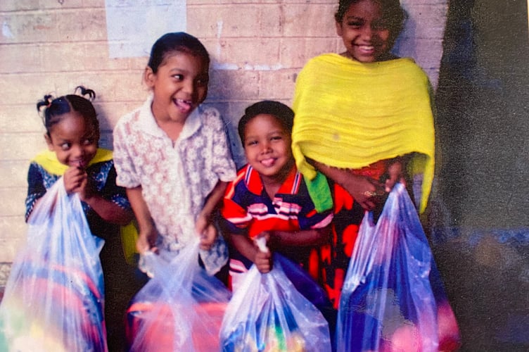 Salvation Army missionary Joan Williams, of Tavistock meets orphans on her final visit to India.