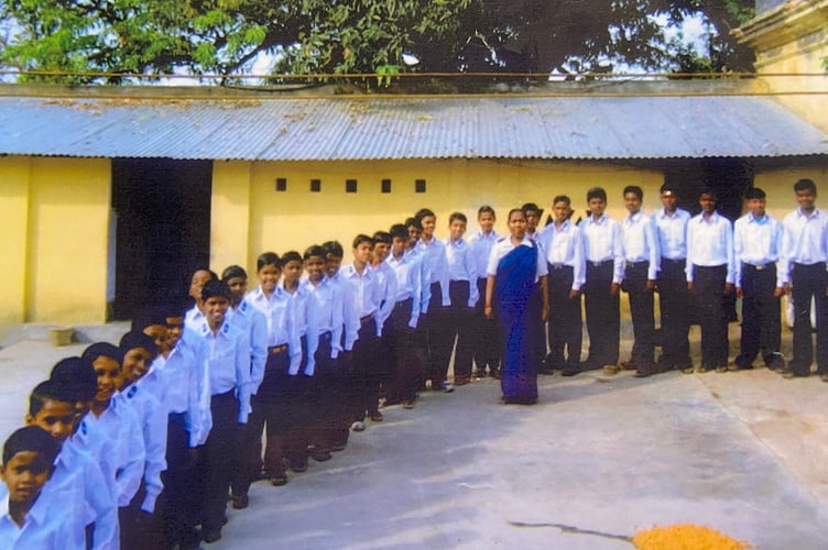 Salvation Army missionary Joan Williams, of Tavistock meets orphans on her final visit to India.