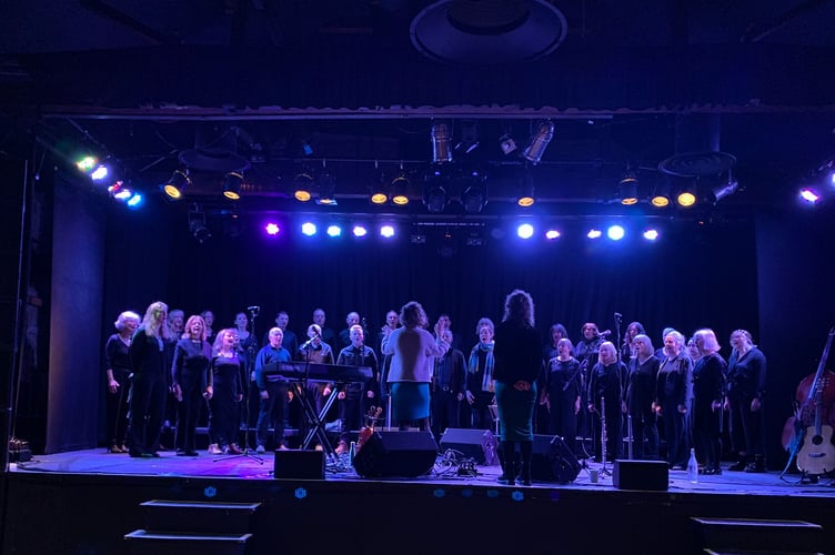 The amateur community Wheelhouse Folk Choir has released an EP for charity. The group is pictured performing at The Wharf Tavistock.
