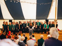 Community choirs record for charity
