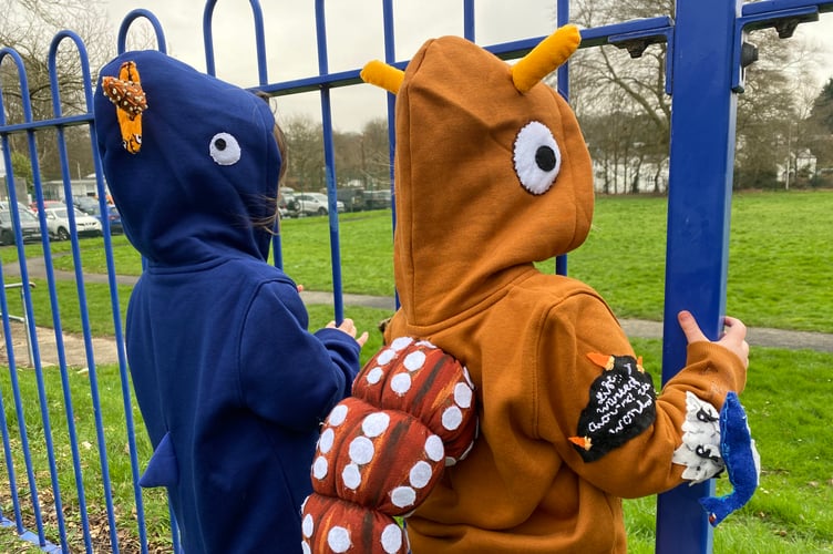 Presley and Ivy dressed as Julia Donaldson's characters from her book The Snail and the Whale at Tavistock Primary's World Book Day celebration.
