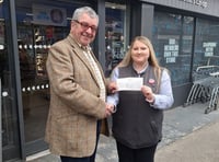 Co-op donates £150 to Gunnislake village hall for repairs