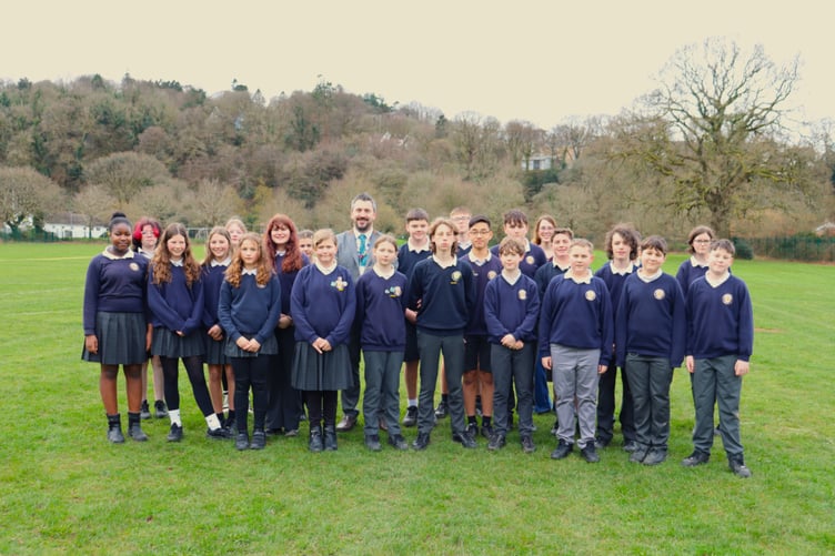 Okehampton College pupils celebrating the Ofsted report with principal Garth Smith.