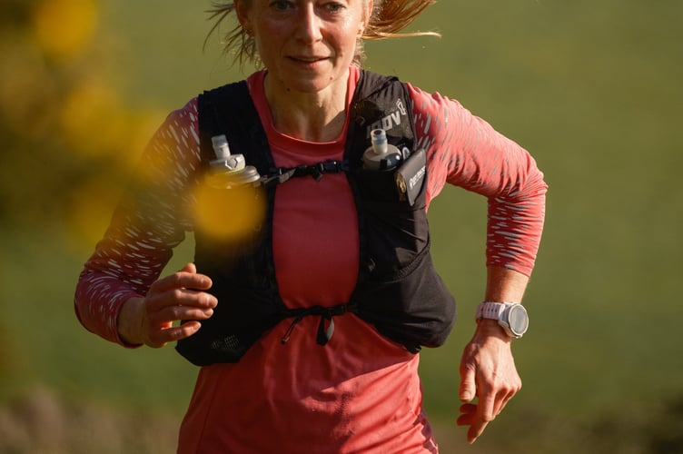 ORC's Claire Watkins was first female at the Polruan Shuffle.