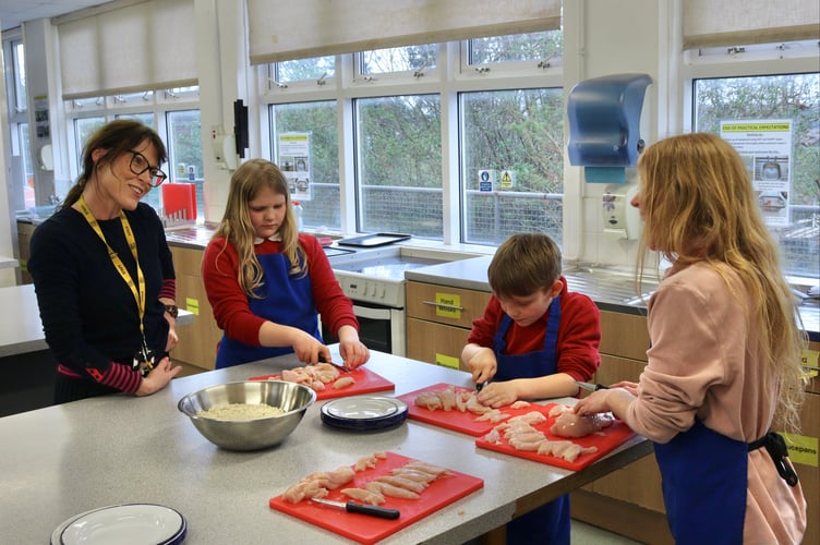 QE Headteacher Paula Smith paid the group a visit