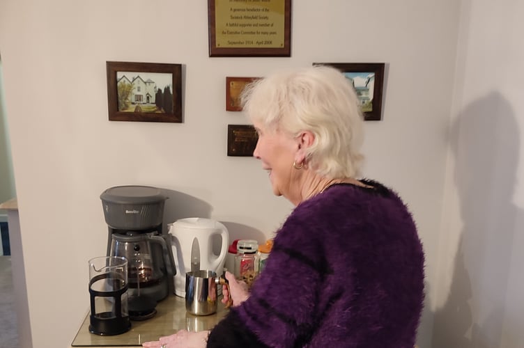 Rotha making the coffee at Drake Lodge.